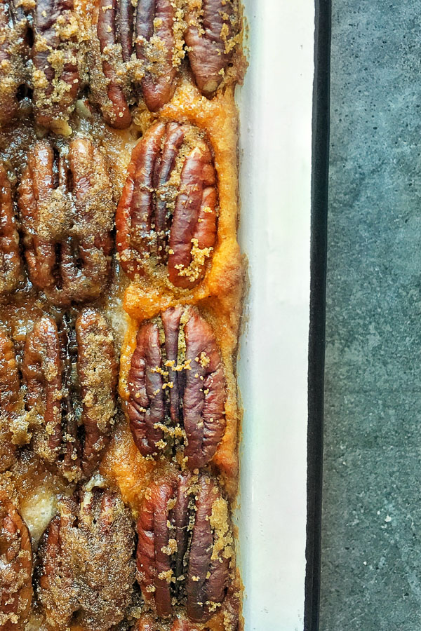 Pecan Topped Sweet Potatoes for a traditional Thanksgiving Feast! Find the recipe on Shutterbean.com