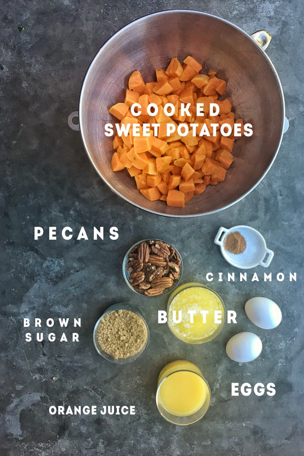 Pecan Topped Sweet Potatoes for a traditional Thanksgiving Feast! Find the recipe on Shutterbean.com