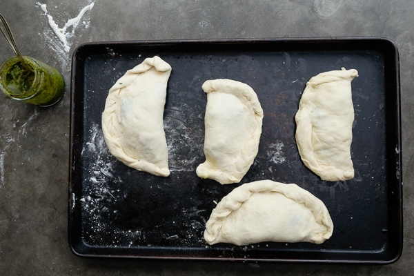 If you're looking for a great vegetarian weeknight meal, check out this Spinach Artichoke Calzone recipe on Shutterbean.com!