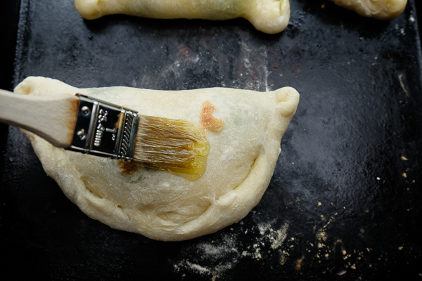 If you're looking for a great vegetarian weeknight meal, check out this Spinach Artichoke Calzone recipe on Shutterbean.com!