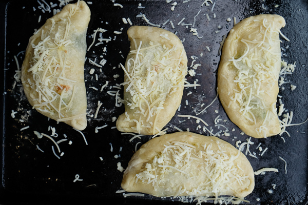 If you're looking for a great vegetarian weeknight meal, check out this Spinach Artichoke Calzone recipe on Shutterbean.com!