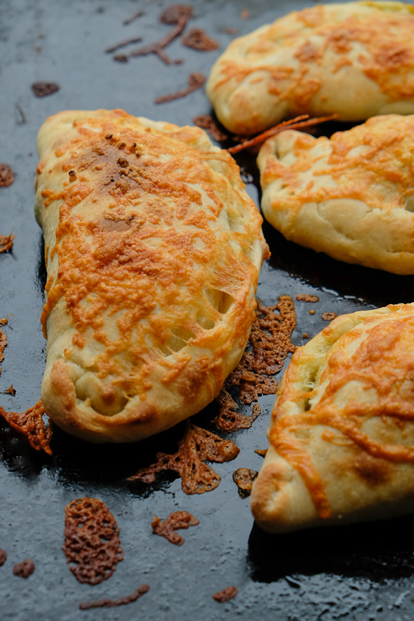 If you're looking for a great vegetarian weeknight meal, check out this Spinach Artichoke Calzone recipe on Shutterbean.com!