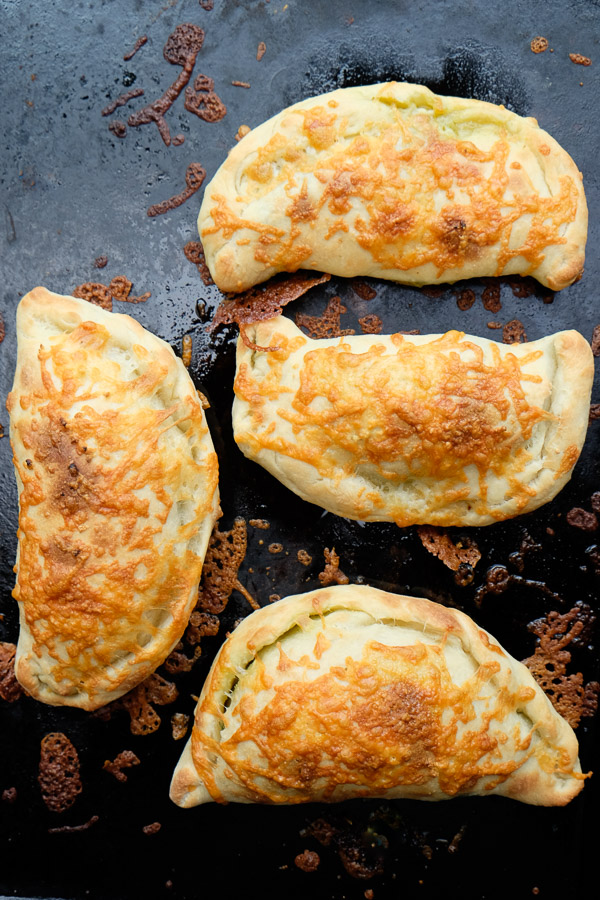 If you're looking for a great vegetarian weeknight meal, check out this Spinach Artichoke Calzone recipe on Shutterbean.com!