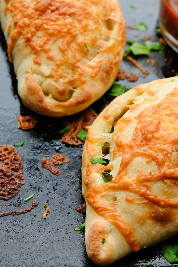 If you're looking for a great vegetarian weeknight meal, check out this Spinach Artichoke Calzone recipe on Shutterbean.com!