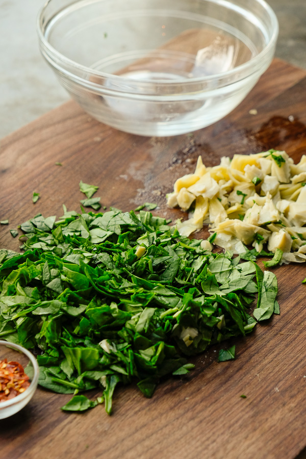 If you're looking for a great vegetarian weeknight meal, check out this Spinach Artichoke Calzone recipe on Shutterbean.com!