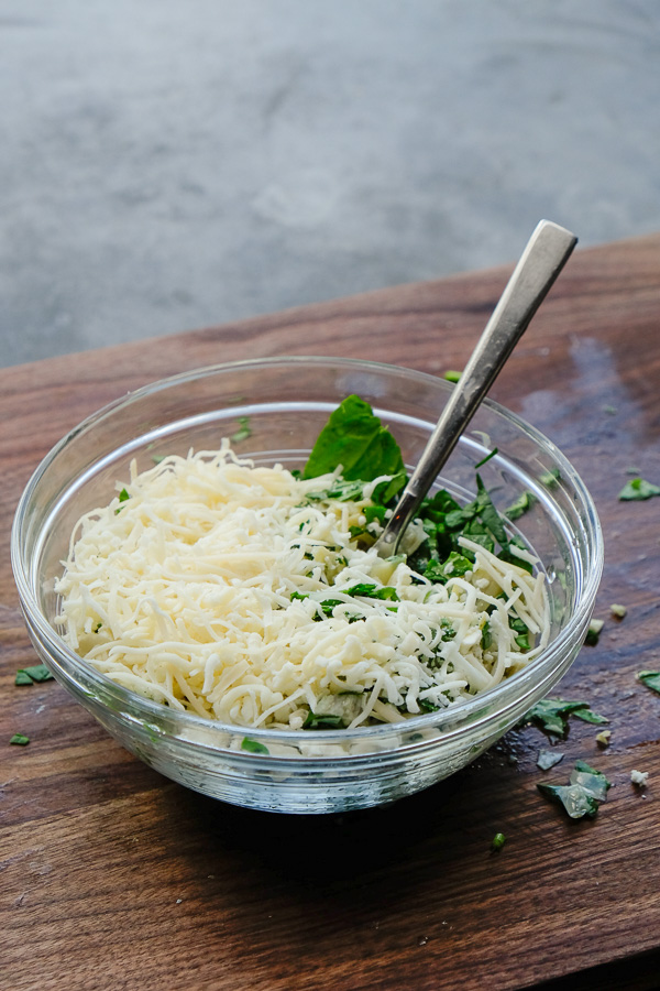 If you're looking for a great vegetarian weeknight meal, check out this Spinach Artichoke Calzone recipe on Shutterbean.com!