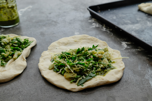 If you're looking for a great vegetarian weeknight meal, check out this Spinach Artichoke Calzone recipe on Shutterbean.com!