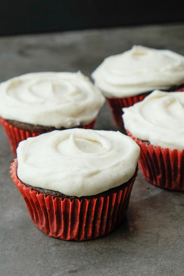 Small Batch Chocolate Cupcakes with Vanilla Bean Frosting. Recipe makes only 4! Check out more on Shutterbean.com