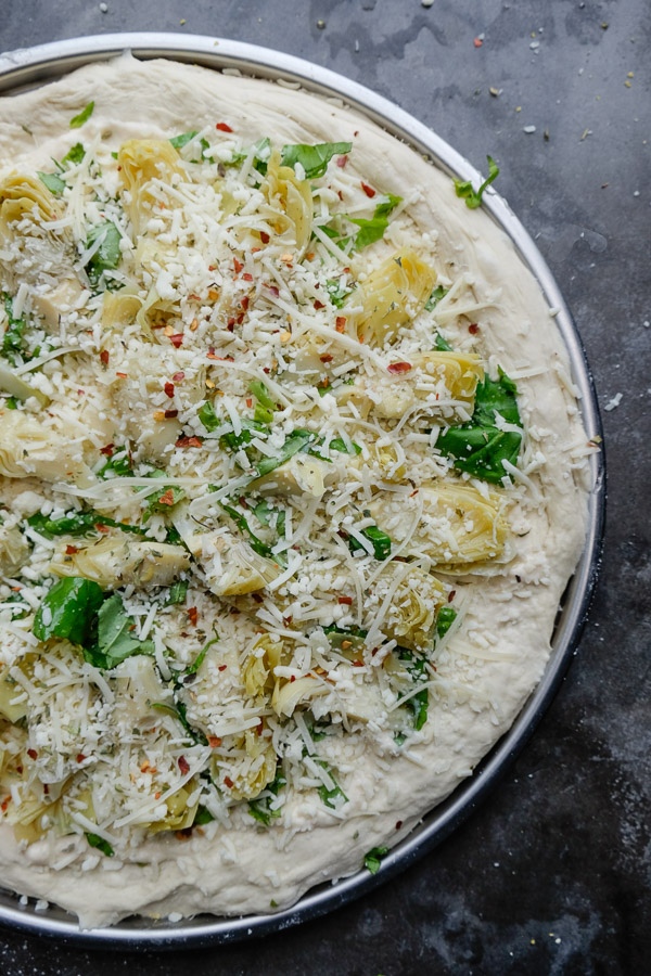 A few items from Trader Joe's and you have yourself Creamy Artichoke Pizza. Find the recipe on Shutterbean.com!