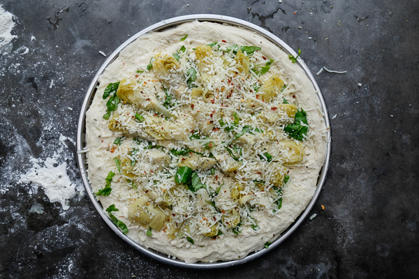 A few items from Trader Joe's and you have yourself Creamy Artichoke Pizza. Find the recipe on Shutterbean.com!