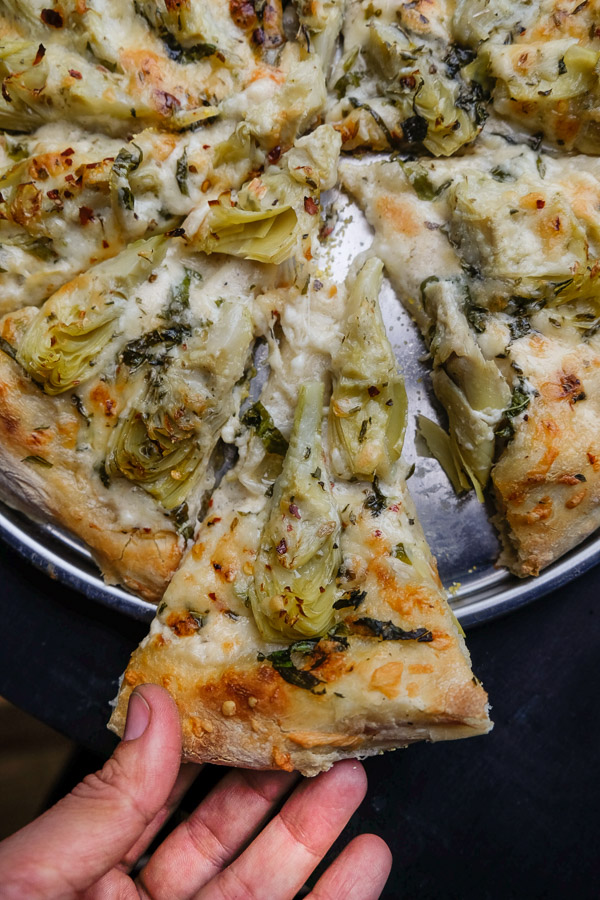 A few items from Trader Joe's and you have yourself Creamy Artichoke Pizza. Find the recipe on Shutterbean.com!