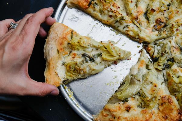 A few items from Trader Joe's and you have yourself Creamy Artichoke Pizza. Find the recipe on Shutterbean.com!