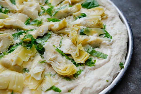 A few items from Trader Joe's and you have yourself Creamy Artichoke Pizza. Find the recipe on Shutterbean.com!