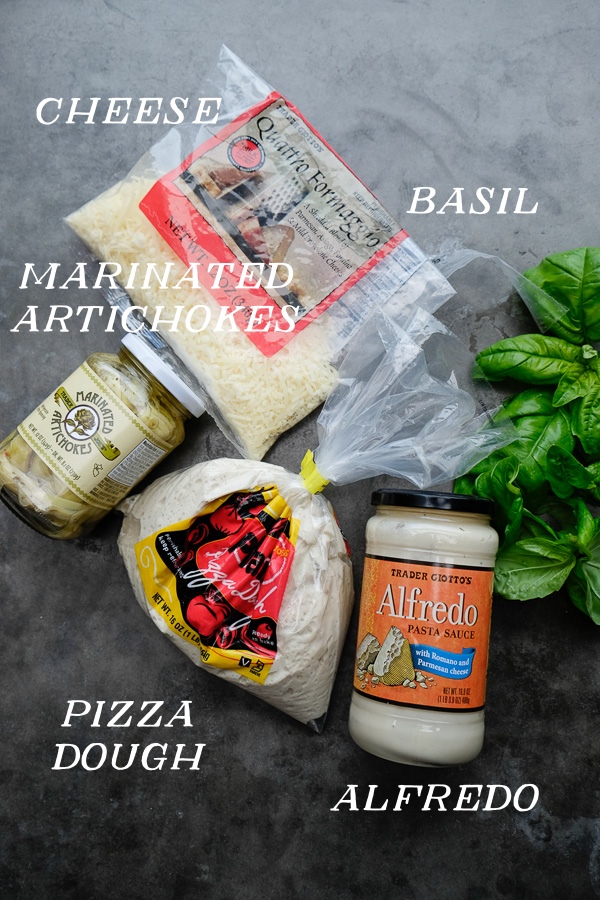 A few items from Trader Joe's and you have yourself Creamy Artichoke Pizza. Find the recipe on Shutterbean.com!