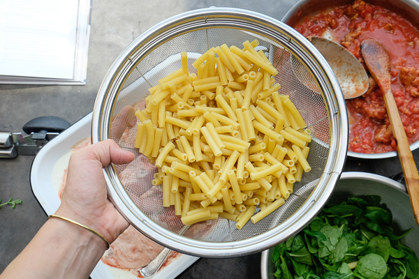 Baked Ziti with Creme Fraiche & Spinach- perfect for a crowd /weeknight dinners. Find the recipe on Shutterbean.com!