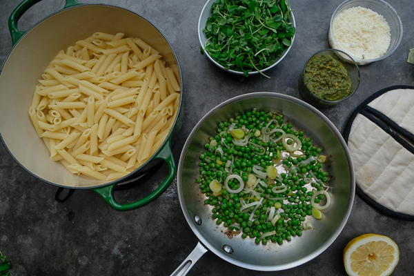 Celebrate Spring goodness with a bowl of Penne with Pistachio Mint Pesto. Find the recipe on Shutterbean.com