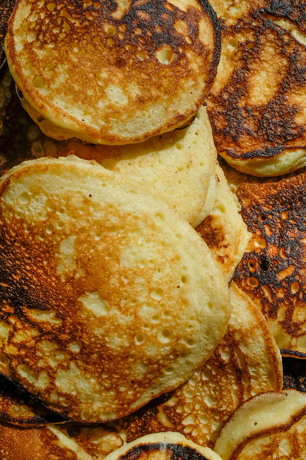 Light and Fluffy Ricotta Pancakes with Roasted Strawberries- find the recipe on Shutterbean.com!