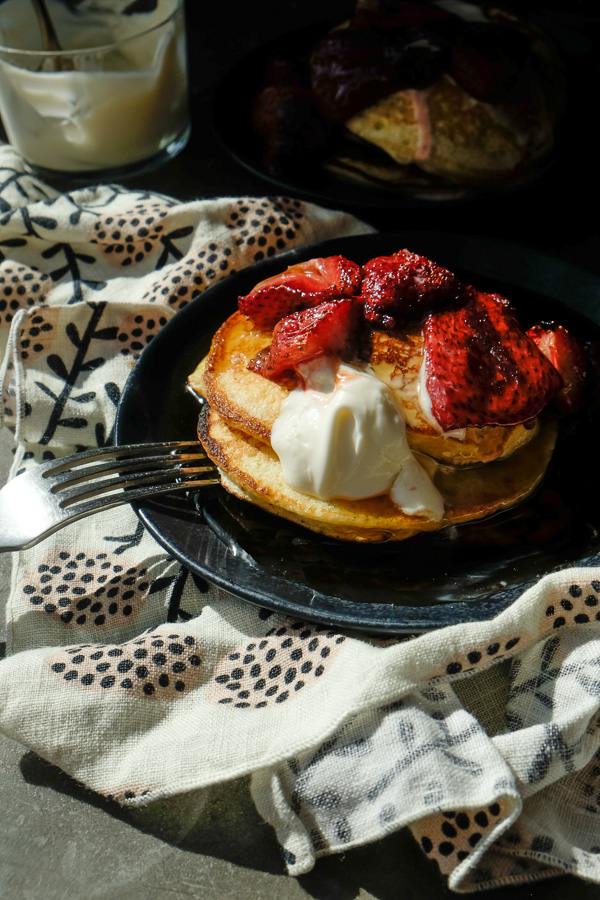 Light and Fluffy Ricotta Pancakes with Roasted Strawberries- find the recipe on Shutterbean.com!