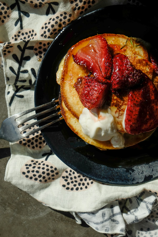 Light and Fluffy Ricotta Pancakes with Roasted Strawberries- find the recipe on Shutterbean.com!