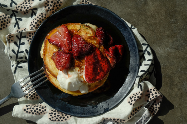 Light and Fluffy Ricotta Pancakes with Roasted Strawberries- find the recipe on Shutterbean.com!