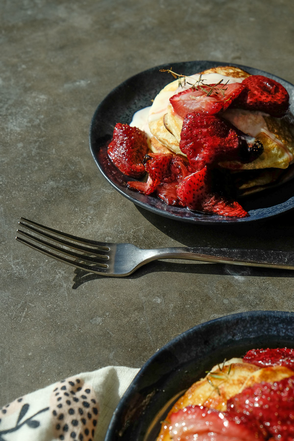 Light and Fluffy Ricotta Pancakes with Roasted Strawberries- find the recipe on Shutterbean.com!