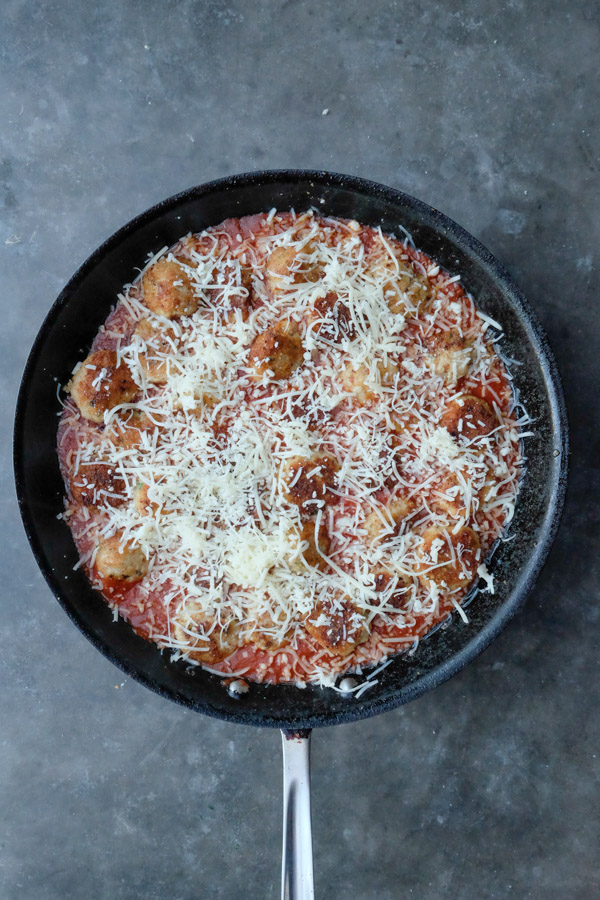 Combine the flavors of Chicken Parmesan with meatballs with this Chicken Parmesan Meatball dish! Find the recipe on Shutterbean.com