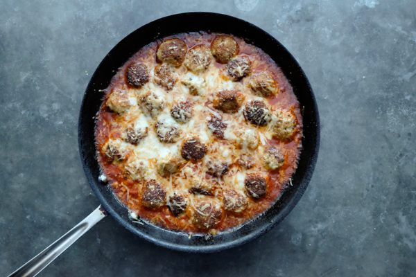 Combine the flavors of Chicken Parmesan with meatballs with this Chicken Parmesan Meatball dish! Find the recipe on Shutterbean.com