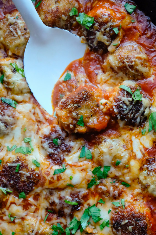 Combine the flavors of Chicken Parmesan with meatballs with this Chicken Parmesan Meatball dish! Find the recipe on Shutterbean.com