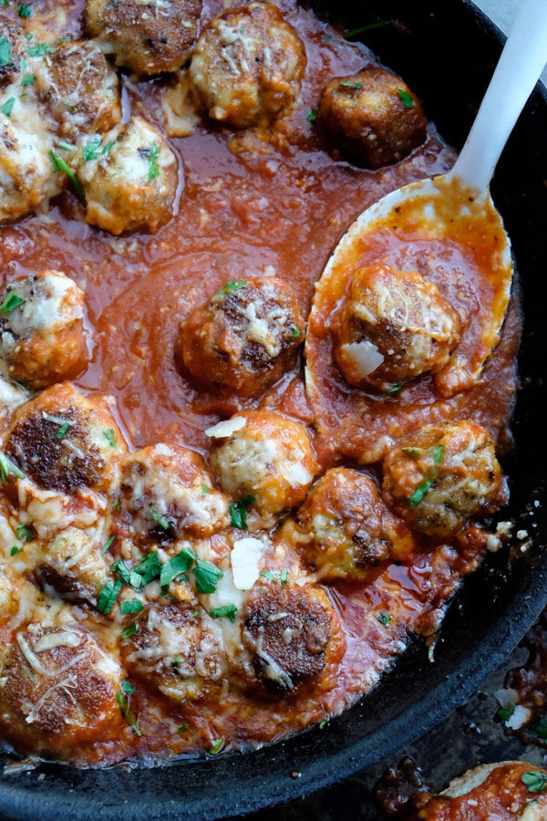 Combine the flavors of Chicken Parmesan with meatballs with this Chicken Parmesan Meatball dish! Find the recipe on Shutterbean.com