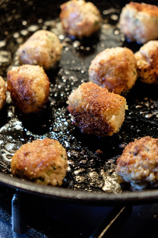 Combine the flavors of Chicken Parmesan with meatballs with this Chicken Parmesan Meatball dish! Find the recipe on Shutterbean.com