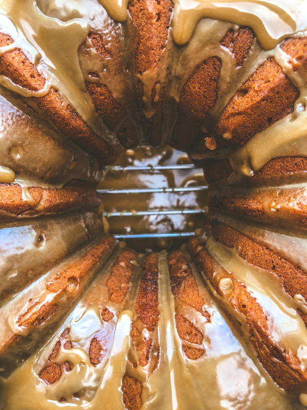 Spiced Brown Sugar Pound Cake with Rum Molasses Glaze is the perfect way to build community! Find the recipe on Shutterbean.com