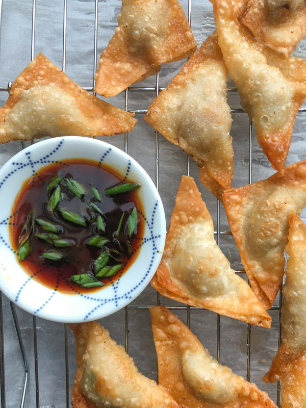 Forget takeout! Make Pork Scallion Wontons at home. They're so easy! Find the recipe at Shutterbean.com