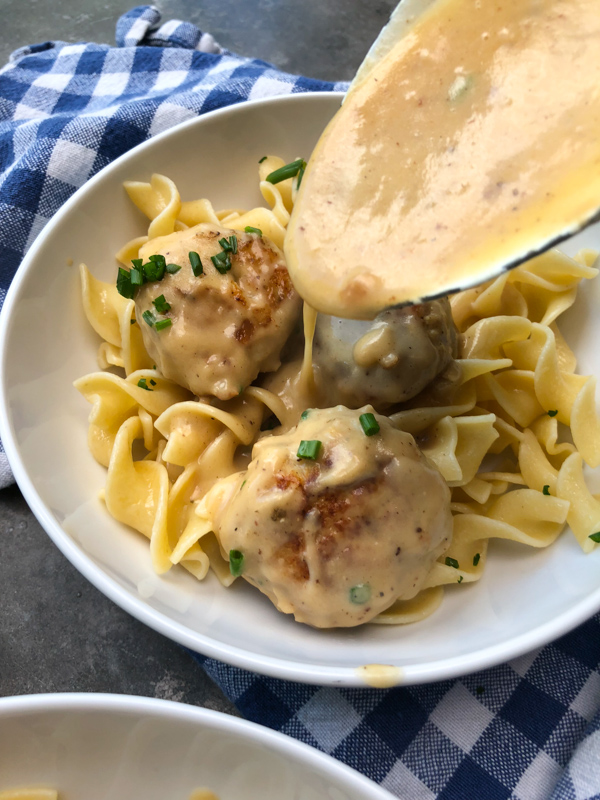 Meatballs Marsala with Buttered Egg Noodles & Chives. Recipe from the new Smitten Kitchen Everyday Cookbook. Find the recipe on Shutterbean.com