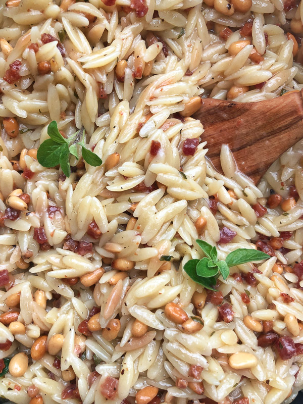 Orzo with Pancetta and Pine Nuts - a delicious/easy to prepare dinner! Find the recipe on Shutterbean.com