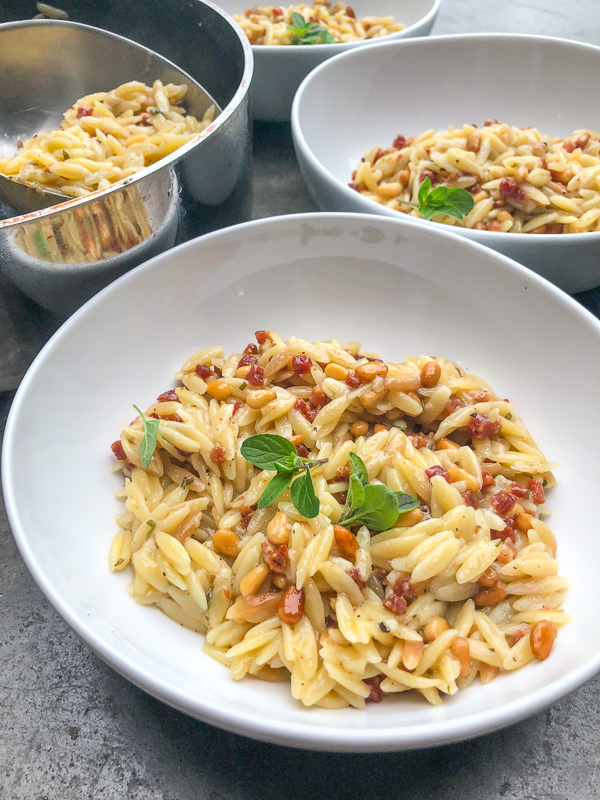 Orzo with Pancetta and Pine Nuts - a delicious/easy to prepare dinner! Find the recipe on Shutterbean.com