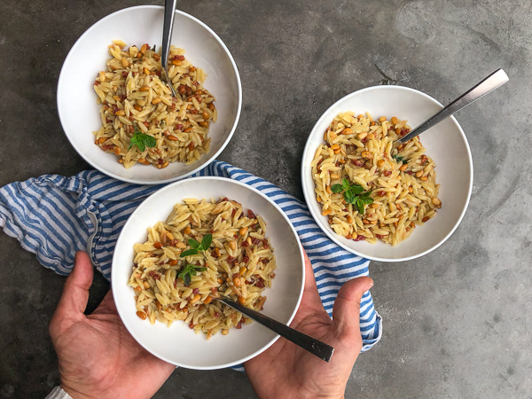 Orzo with Pancetta and Pine Nuts - a delicious/easy to prepare dinner! Find the recipe on Shutterbean.com