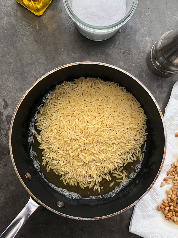 Orzo with Pancetta and Pine Nuts - a delicious/easy to prepare dinner! Find the recipe on Shutterbean.com