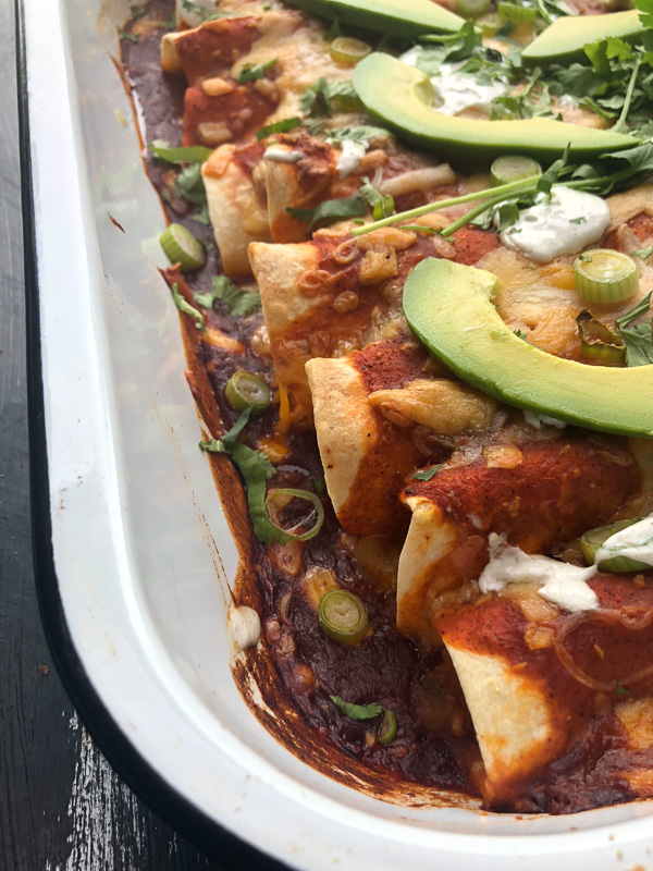 Chicken Enchiladas with Cumin Crema is a snap to put together. All you need is a rotisserie chicken! Find the recipe on Shutterbean.com