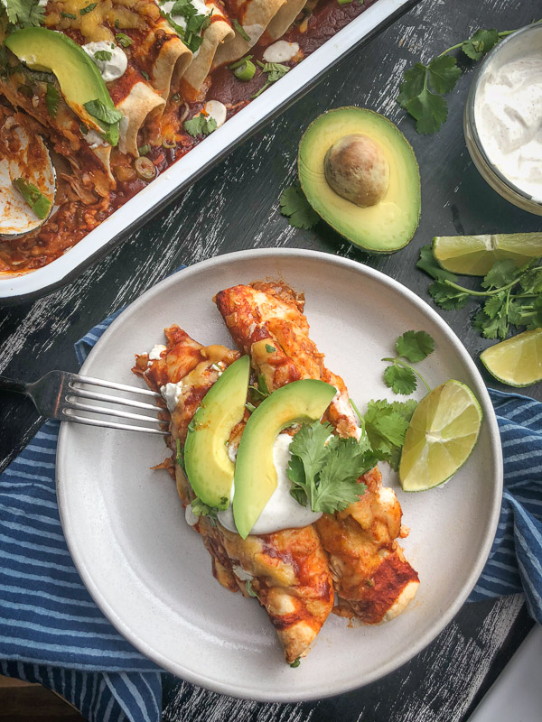 Chicken Enchiladas with Cumin Crema is a snap to put together. All you need is a rotisserie chicken! Find the recipe on Shutterbean.com