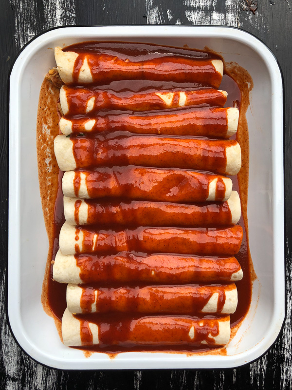 Chicken Enchiladas with Cumin Crema is a snap to put together. All you need is a rotisserie chicken! Find the recipe on Shutterbean.com