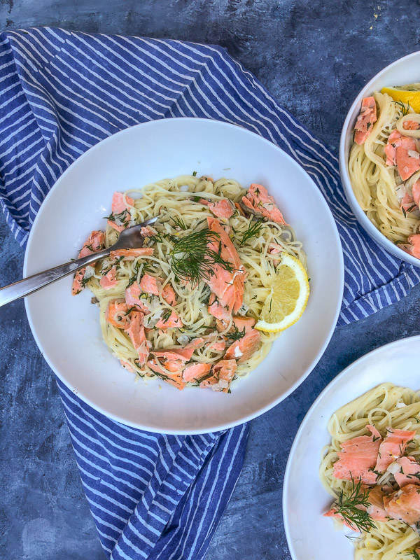 Lemon Dill Capellini with Salmon is a great light Summer dish. A great use for salmon leftovers. Find the recipe on Shutterbean.com