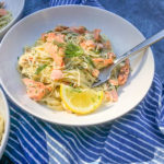 Lemon Dill Capellini with Salmon is a great light Summer dish. A great use for salmon leftovers. Find the recipe on Shutterbean.com