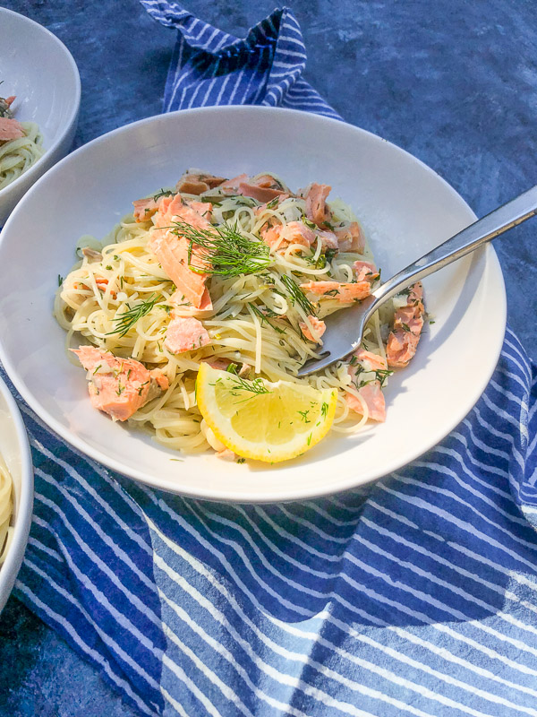 Lemon Dill Capellini with Salmon is a great light Summer dish. A great use for salmon leftovers. Find the recipe on Shutterbean.com