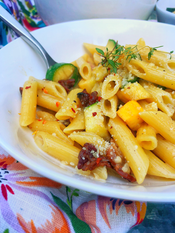 Creamy Zucchini Carbonara made with fresh zucchini and crispy bacon! Find the recipe on Shutterbean.com