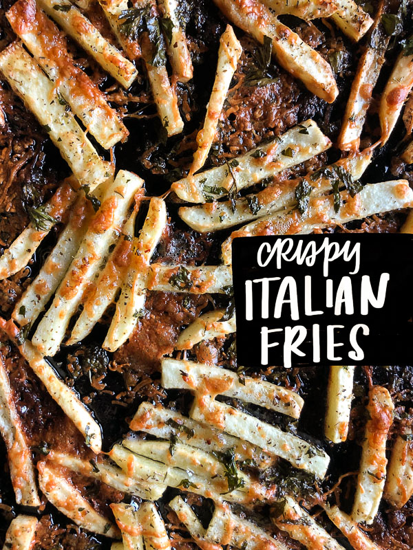 Want to impress dinner guests? Make these crispy Italian Fries! A combination of melted cheese and Italian herbs will level up your baked oven fry game. Recipe on Shutterbean.com!