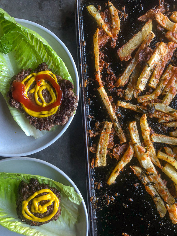 Want to impress dinner guests? Make these crispy Italian Fries! A combination of melted cheese and Italian herbs will level up your baked oven fry game. Recipe on Shutterbean.com!