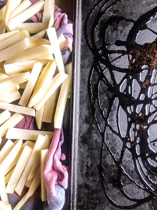 Want to impress dinner guests? Make these crispy Italian Fries! A combination of melted cheese and Italian herbs will level up your baked oven fry game. Recipe on Shutterbean.com!