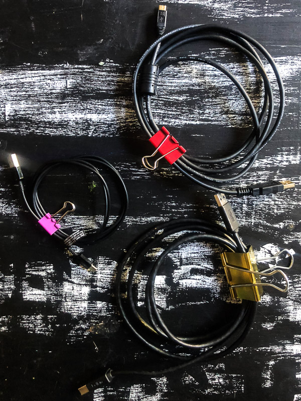 Have you ever wondered, "How Can I Keep my Cords Organized?" Tracy from Shutterbean shows you how with her resourceful cord organization system!