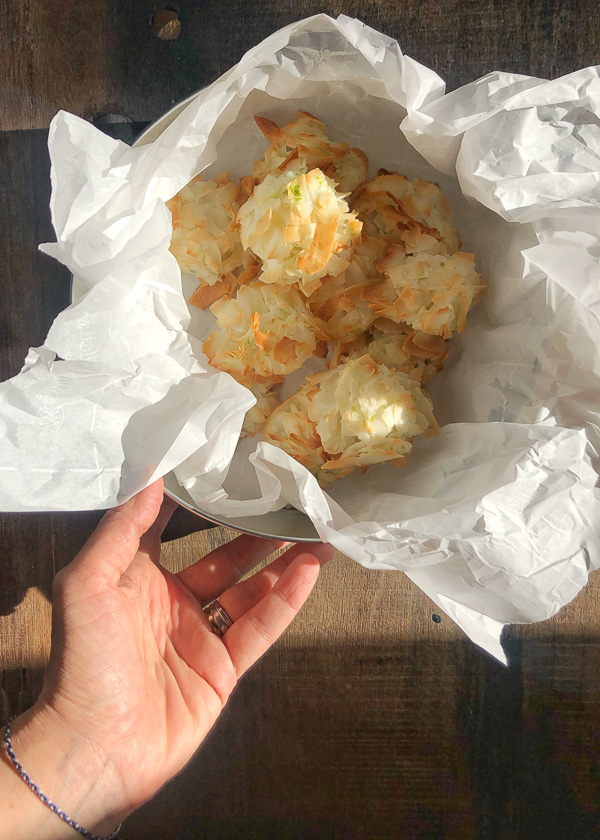 Coconut Lime Macaroons are light, chewy and crispy! Add them to your gluten free baking repertoire! Find the recipe on Shutterbean.com!