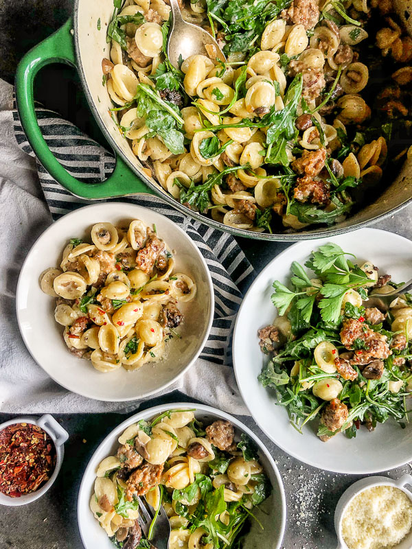 Creamy Mushroom Sausage Orecchiette is the ultimate comfort food. Make it for your guests! Find the recipe on Shutterbean.com